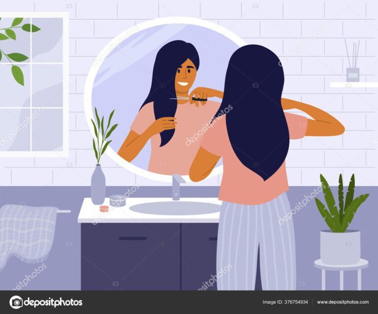 Cómo cortarse el pelo sola en casa sin cometer errores 20 mujer cortandose el pelo frente al espejo